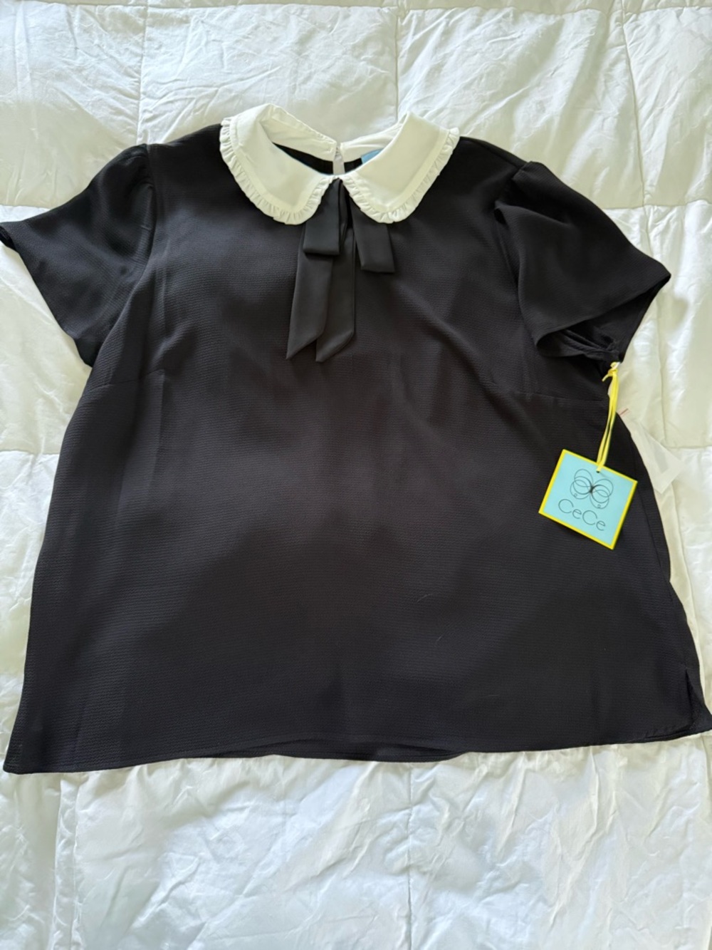 CeCe Black Top with Cream Ruffled Peter Pan Collar